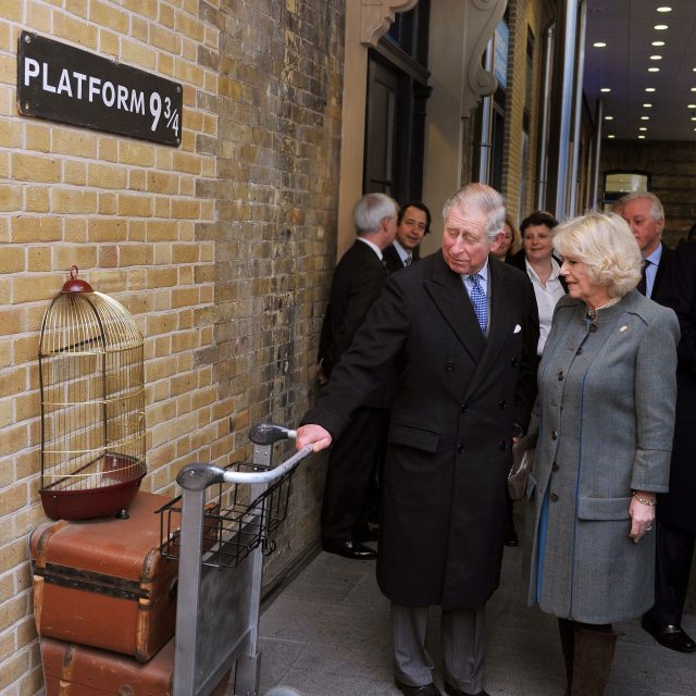 Charles and Camilla visit Platform 9 and 3/4 at Kings Cross Station in London (John Stillwell/PA)