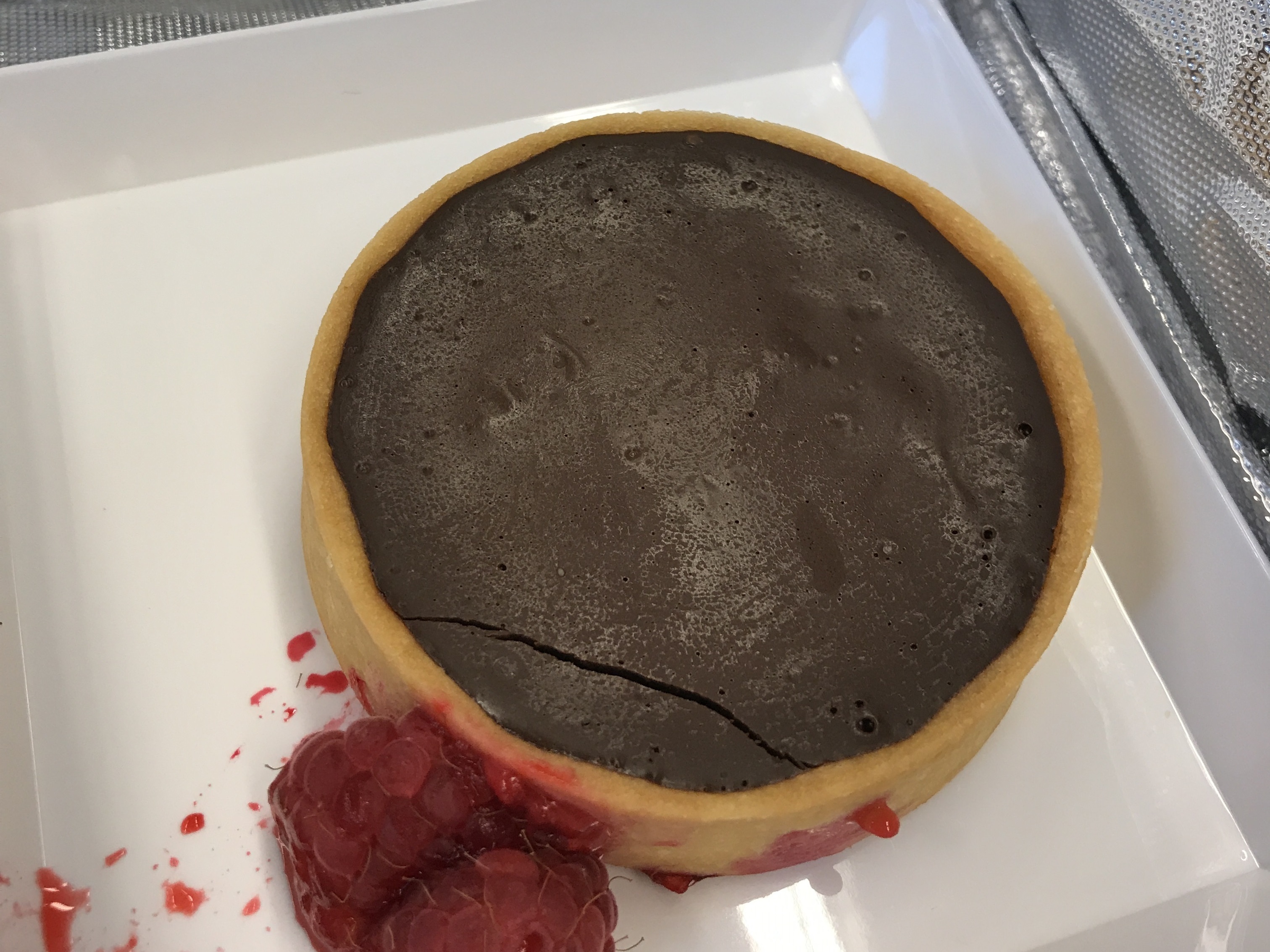 Chocolate tart with raspberries (Ella Walker/PA)