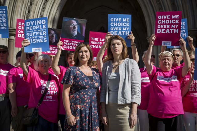 Dignity in Dying chief executive Sarah Wootton, front right, with Christie Arntsen, front left, who has incurable breast cancer