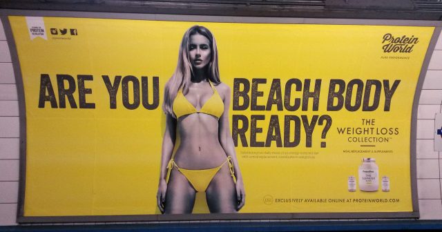 A Protein World advert displayed in an underground station in London which says 