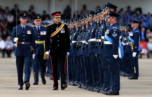 Prince Harry inspects the honour guard at RAF Honington in Suffolk  (Stephen Pond/PA)