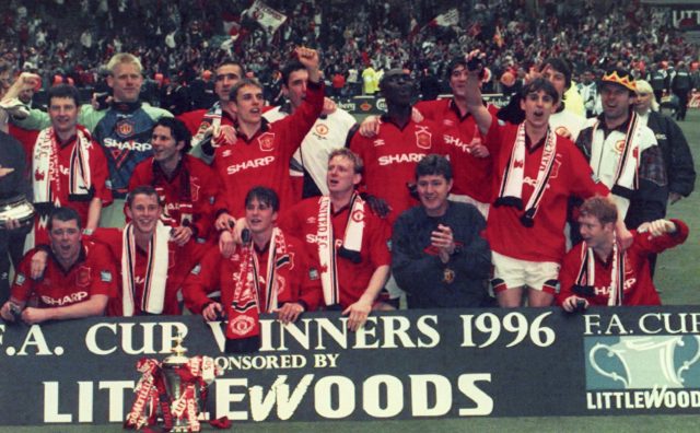 Manchester United celebrate after beating Liverpool 1-0 to win the FA Cup, May 1996 (Adam Butler/PA)