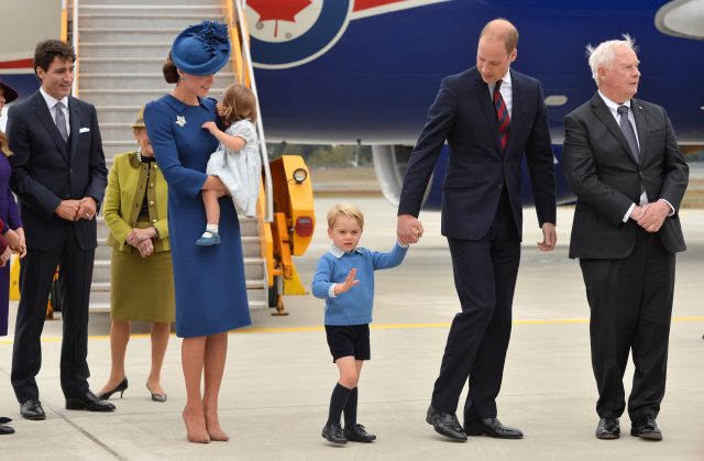 Justin Trudeau (left) watches after greeting the Duke and Duchess of Cambridge, Prince George and Princess Charlotte