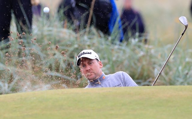 Ian Poulter chips from a bunker (Peter Byrne/PA)