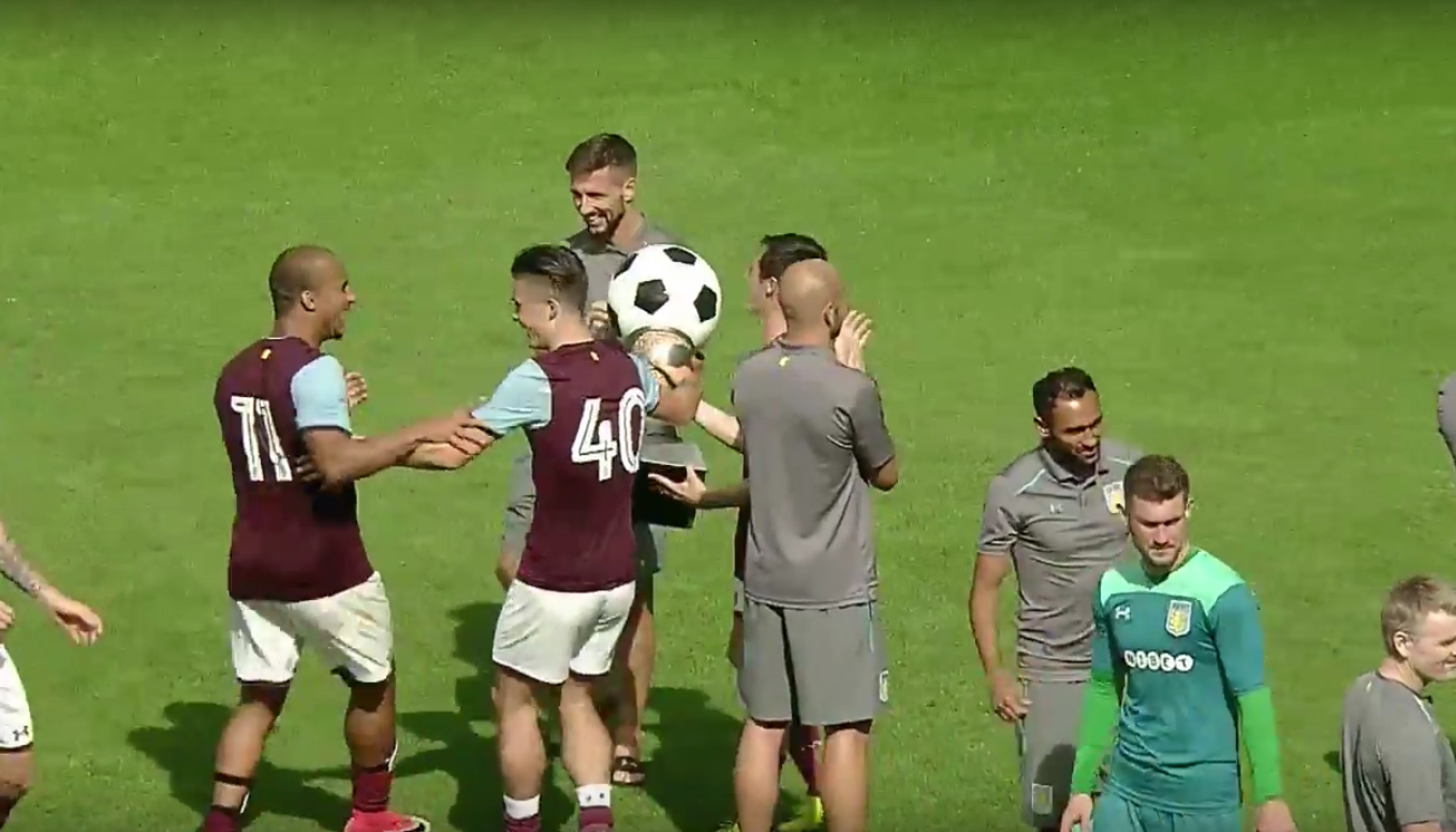 Aston Villa footballers celebrate winning the Cup of Traditions