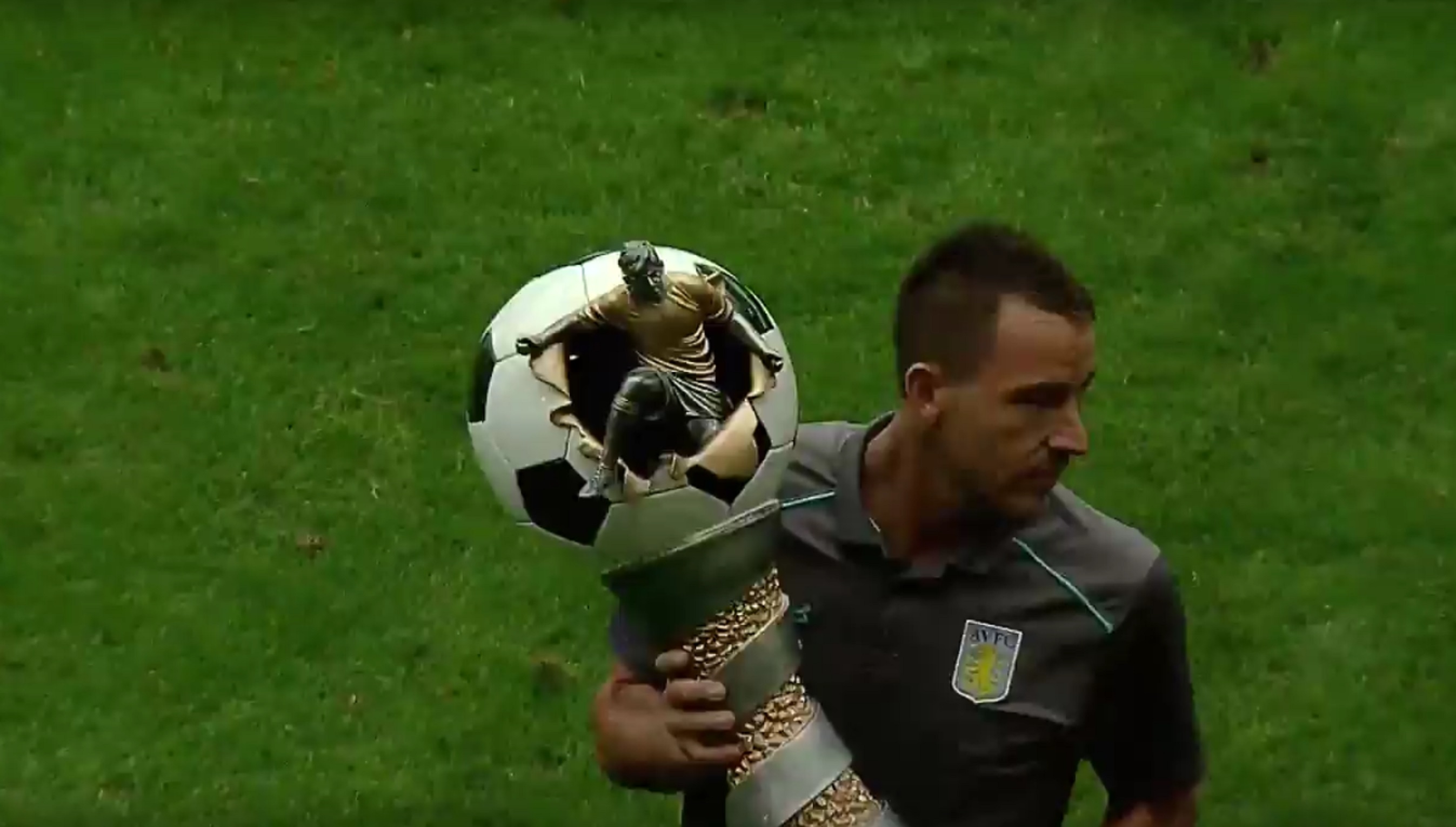 Aston Villa footballers celebrate winning the Cup of Traditions