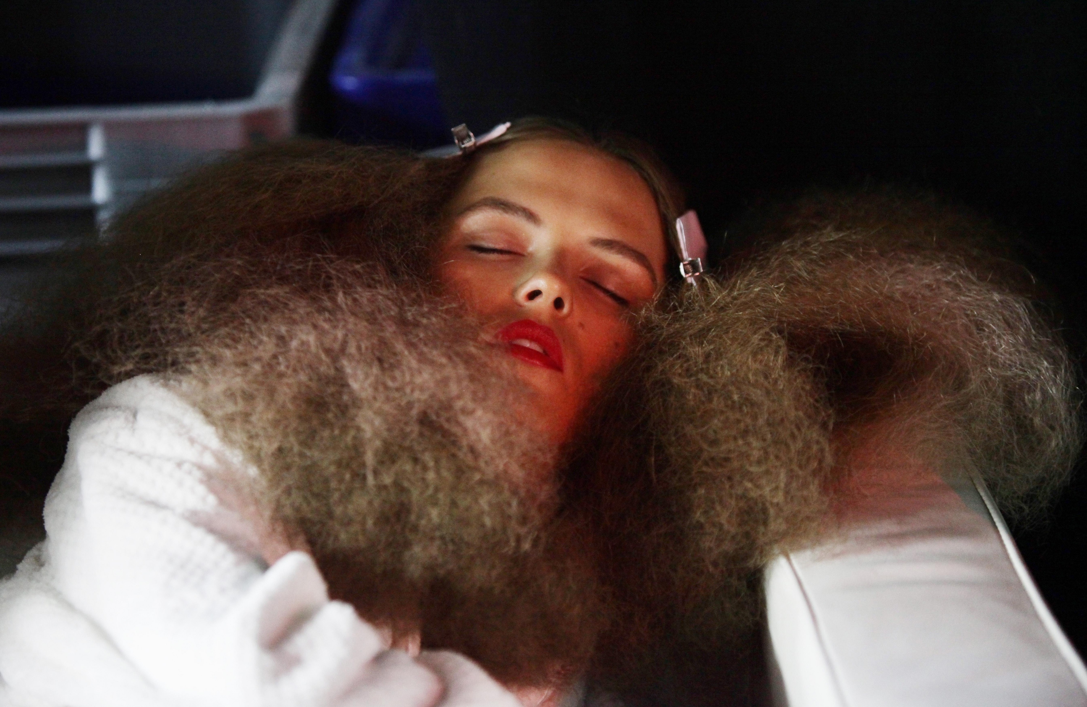 Models backstage before the Unique spring/summer London Fashion Week show