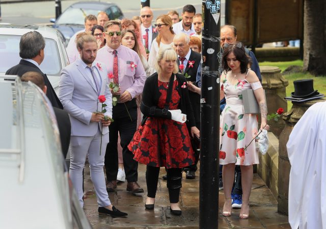 Lisa Roussos arriving with mourners for the funeral service of her daughter Saffie Roussos, who died in the Manchester Arena bombing, at Manchester Cathedral
