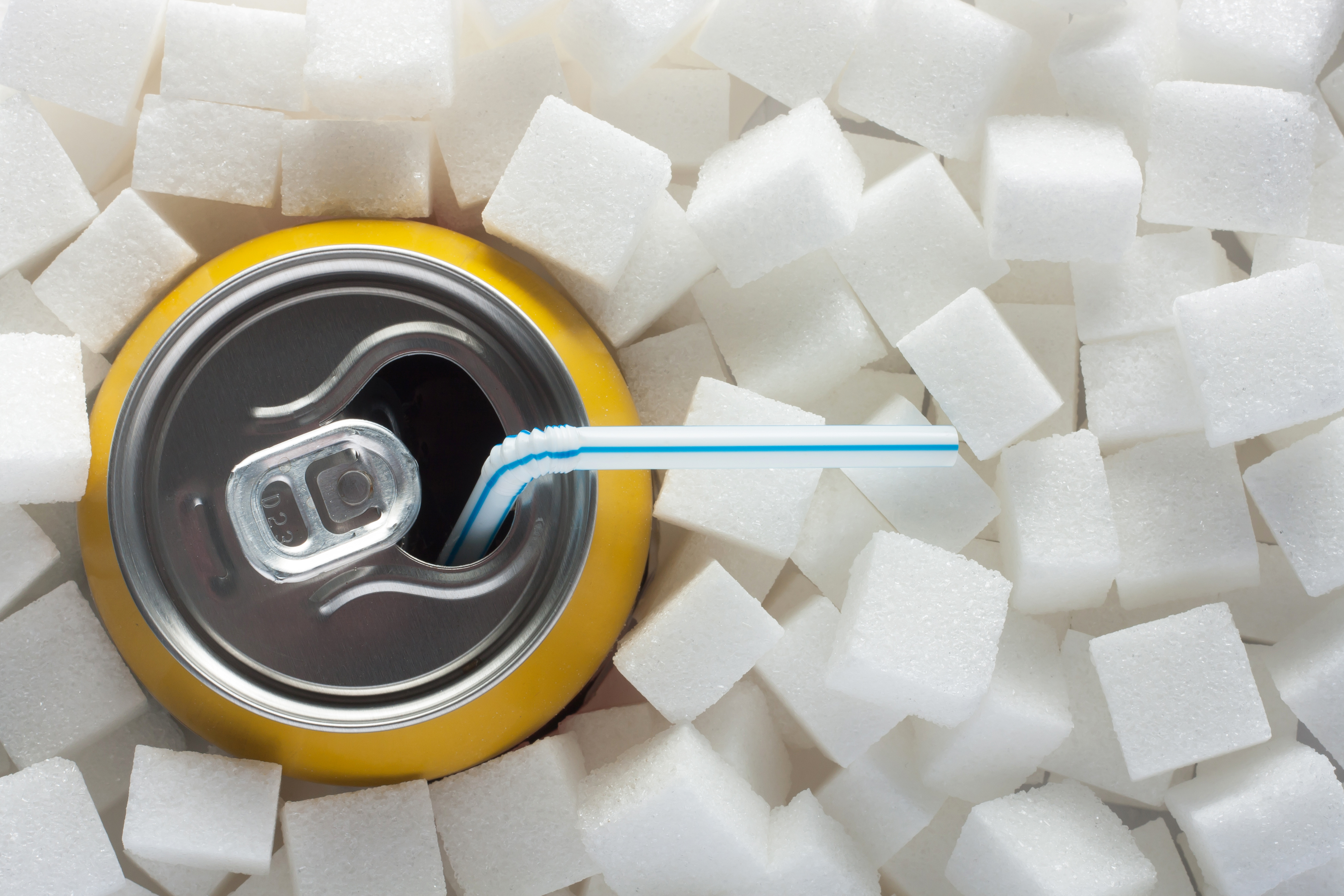 Sugar cubes and a can of drink