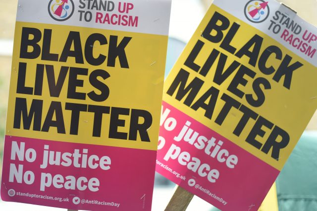 Placards at a protest at Stoke Newington police station. (Lauren Hurley/PA)