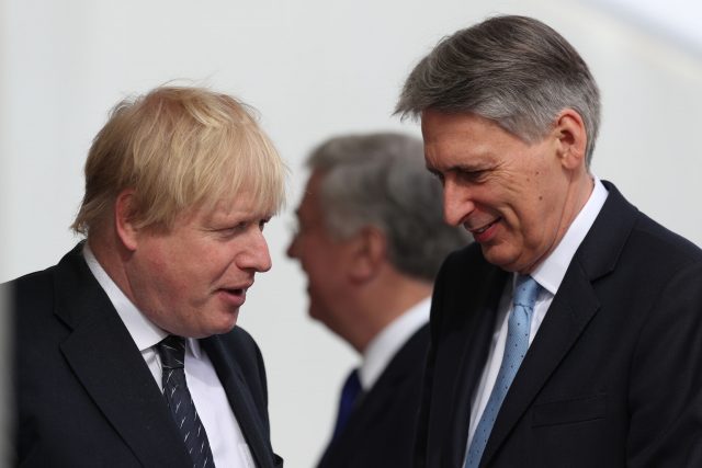 Foreign Secretary Boris Johnson and Chancellor Philip Hammond. (Jonathan Brady/PA)