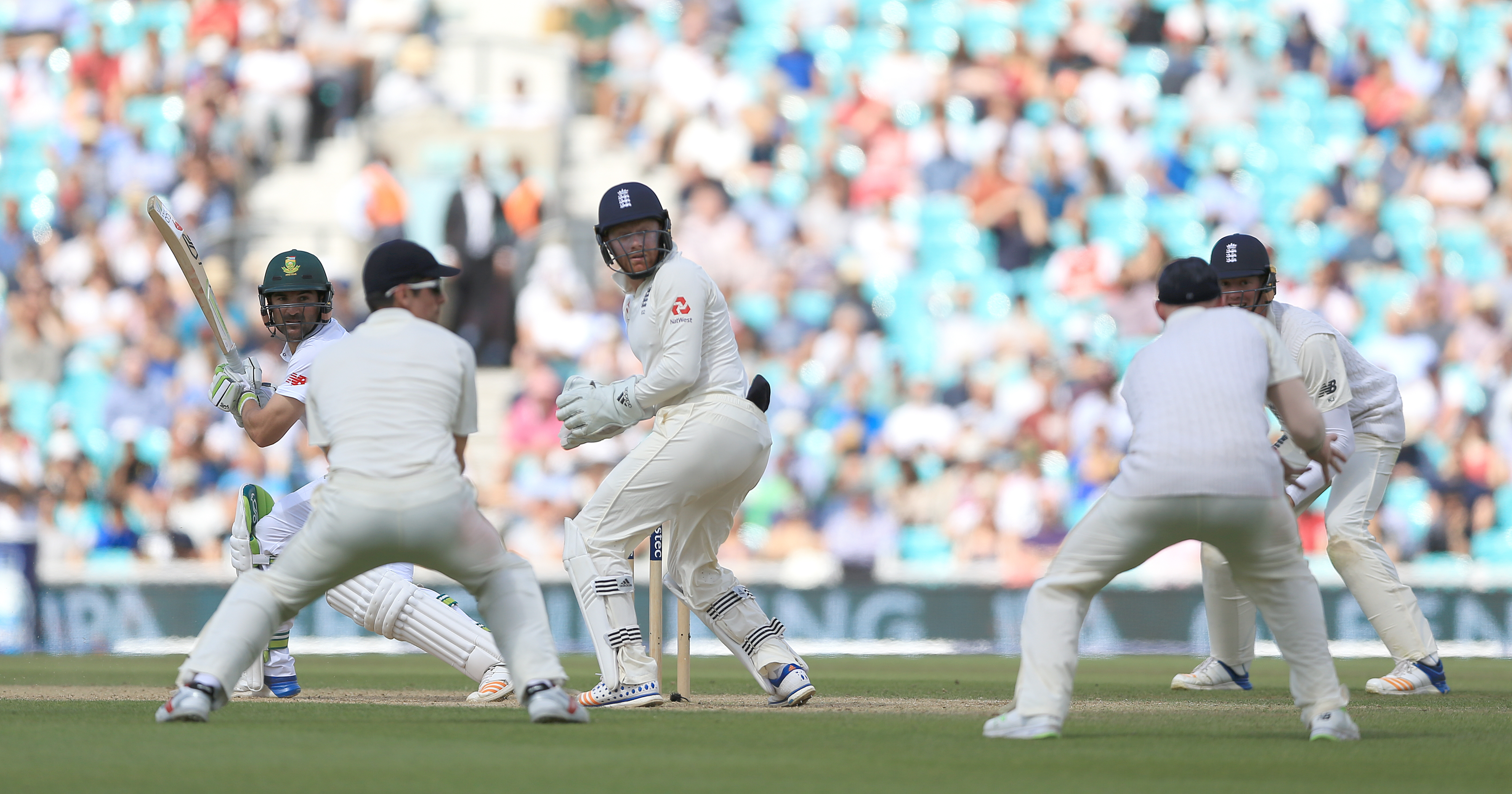 South Africa's Dean Elgar is caught by Ben Stokes off the bowling of Moeen Ali