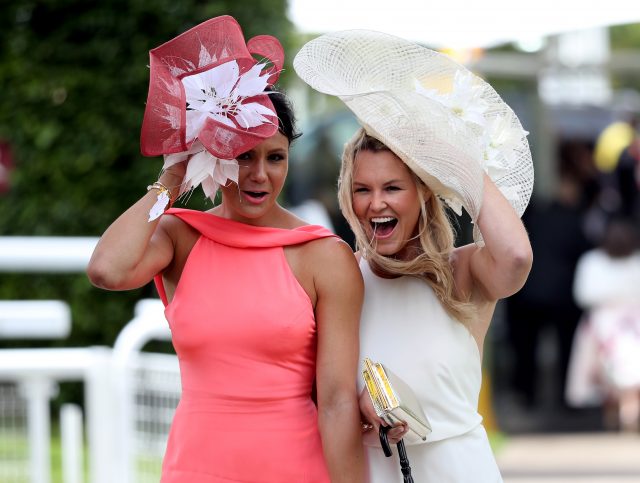 In pictures: Wind batters punters during Ladies Day at Glorious ...