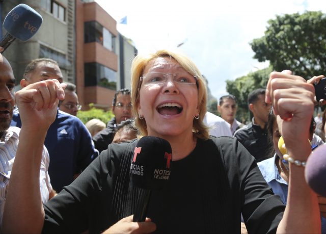 Venezuelan General Prosecutor Luisa Ortega Diaz speaks to the media outside her office (Wil Riera/AP)