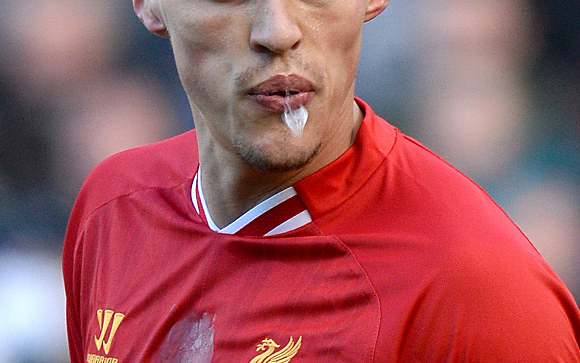 A footballer spits