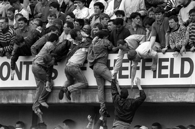 Liverpool fans trying to escape during the Hillsborough disaster (David Giles/PA)