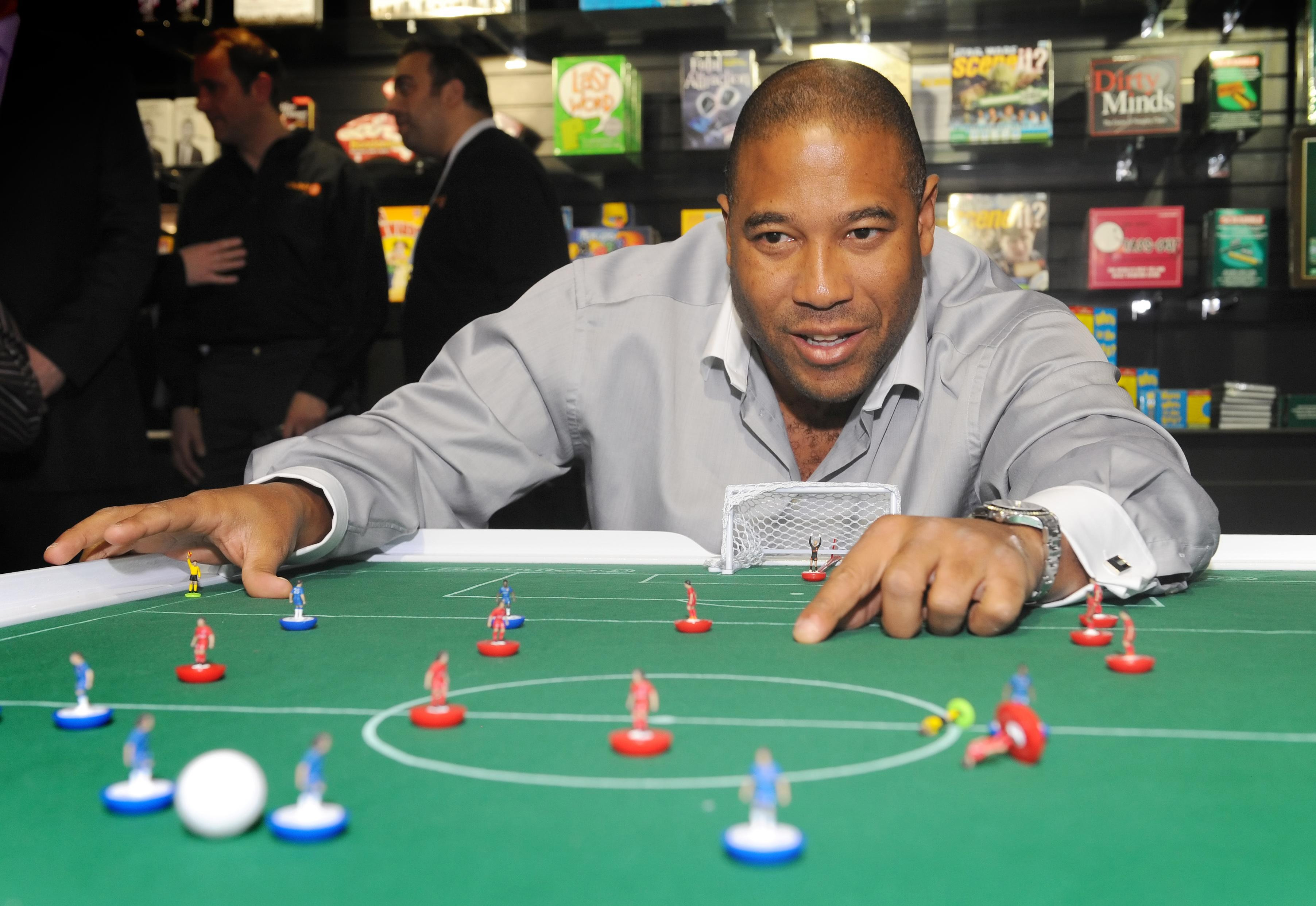 John Barnes playing Subbuteo