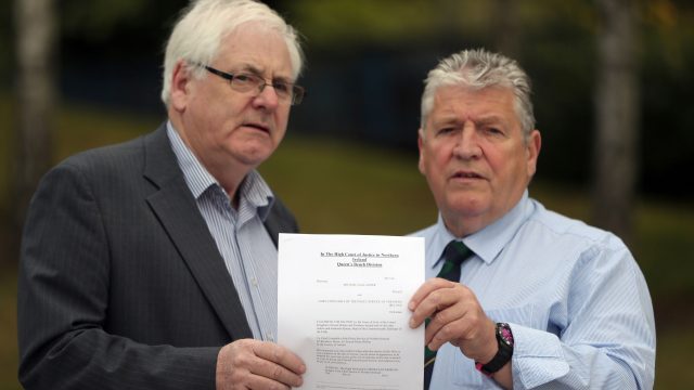 Michael Gallagher and Stanley McComb, who lost his wife Ann in the Omagh bombing hold the writ