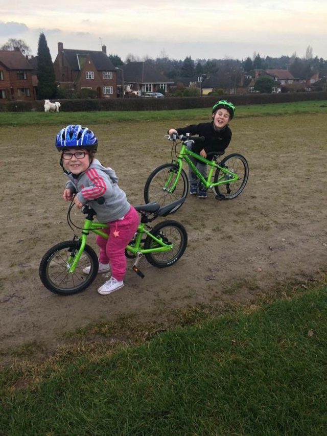 Erin and Jack riding their bikes at their local running track in 2016 (Collect/PA Real Life)