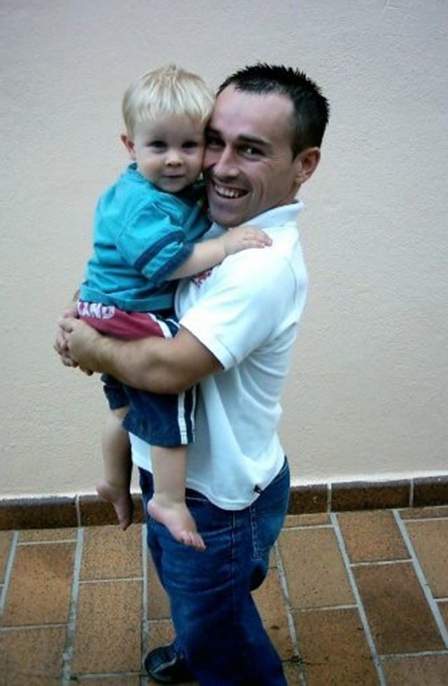 Paul holding Jack when he was around 15 months old (Collect/PA Real Life)