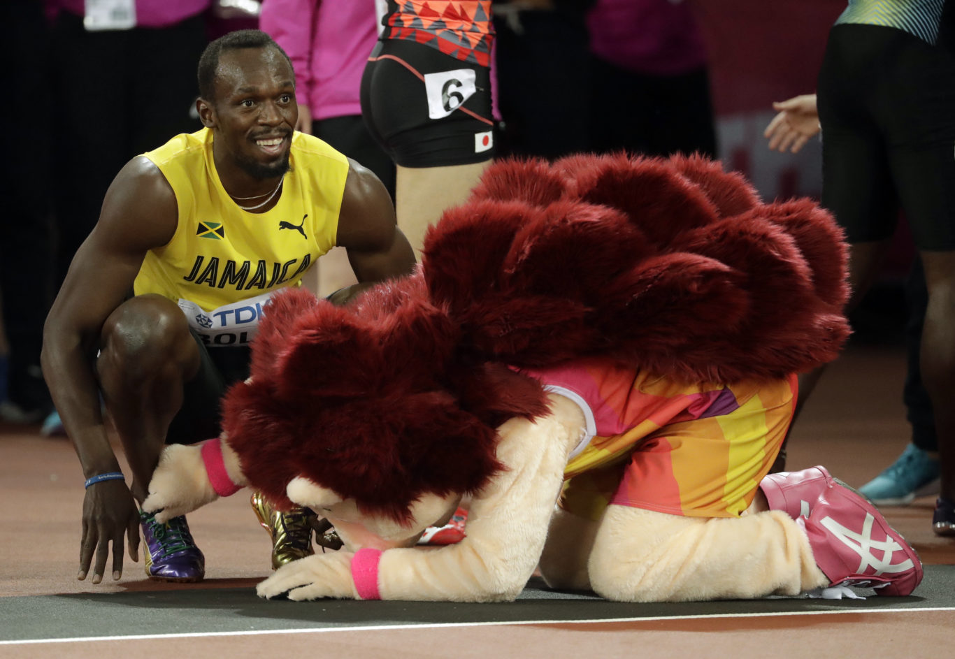 Usain Bolt and hedgehog (Matthias Schrader/AP)