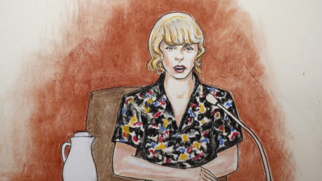 In this courtroom sketch, pop singer Taylor Swift speaks from the witness stand during a trial Thursday, Aug. 10, 2017, in Denver. Swift testified Thursday that David Mueller, a former radio DJ, reached under her skirt and intentionally grabbed her backside during a meet-and-a-greet photo session before a 2013 concert in Denver. (Jeff Kandyba via AP)