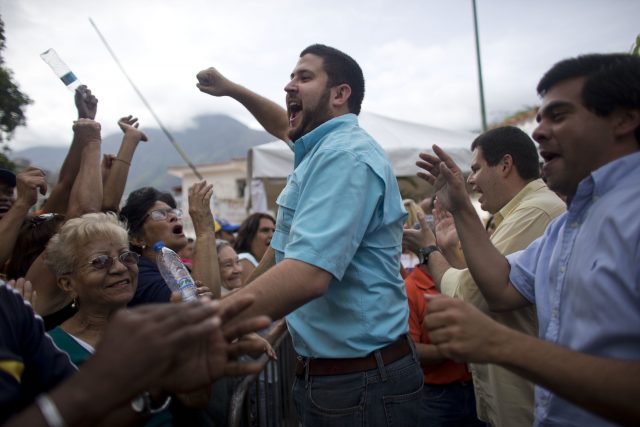 David Smolansky, mayor of El Hatillo district, faces arrest (Ariana Cubillos/AP)