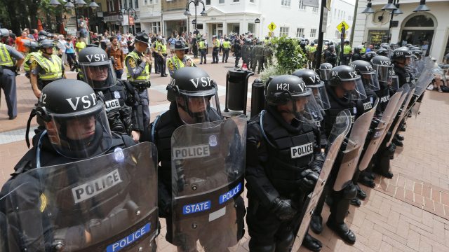 Virginia State Police cordon off an area around the site where a car ran into a group of protesters after a white nationalist rally in Charlottesville