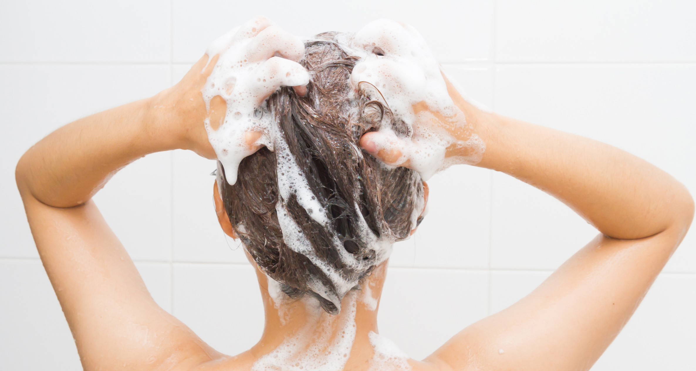 Woman washing her hair (Jringjai/Getty Images)