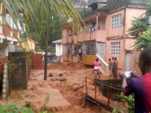 The mudslides hit homes in the capital Freetown where poor drainage exacerbated the situation