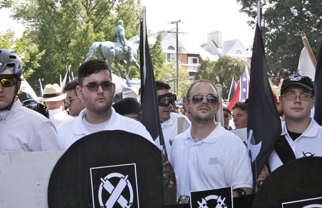 James Alex Fields Jr., second from left, holds a black shield in Charlottesville, Virginia
