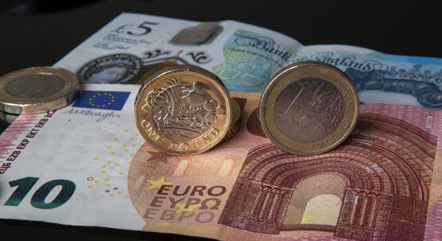 New 12-sided £1 and one euro coins on a new £5 note and 10 euro note