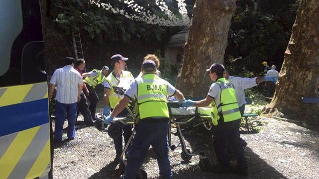 Emergency workers treat an injured person following the incident