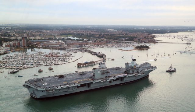 HMS Queen Elizabeth, the UK's newest aircraft carrier, arrives in Portsmouth