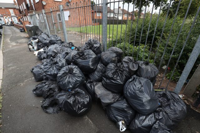 Rubbish bags piled high in Tarry Road, Birmingham 