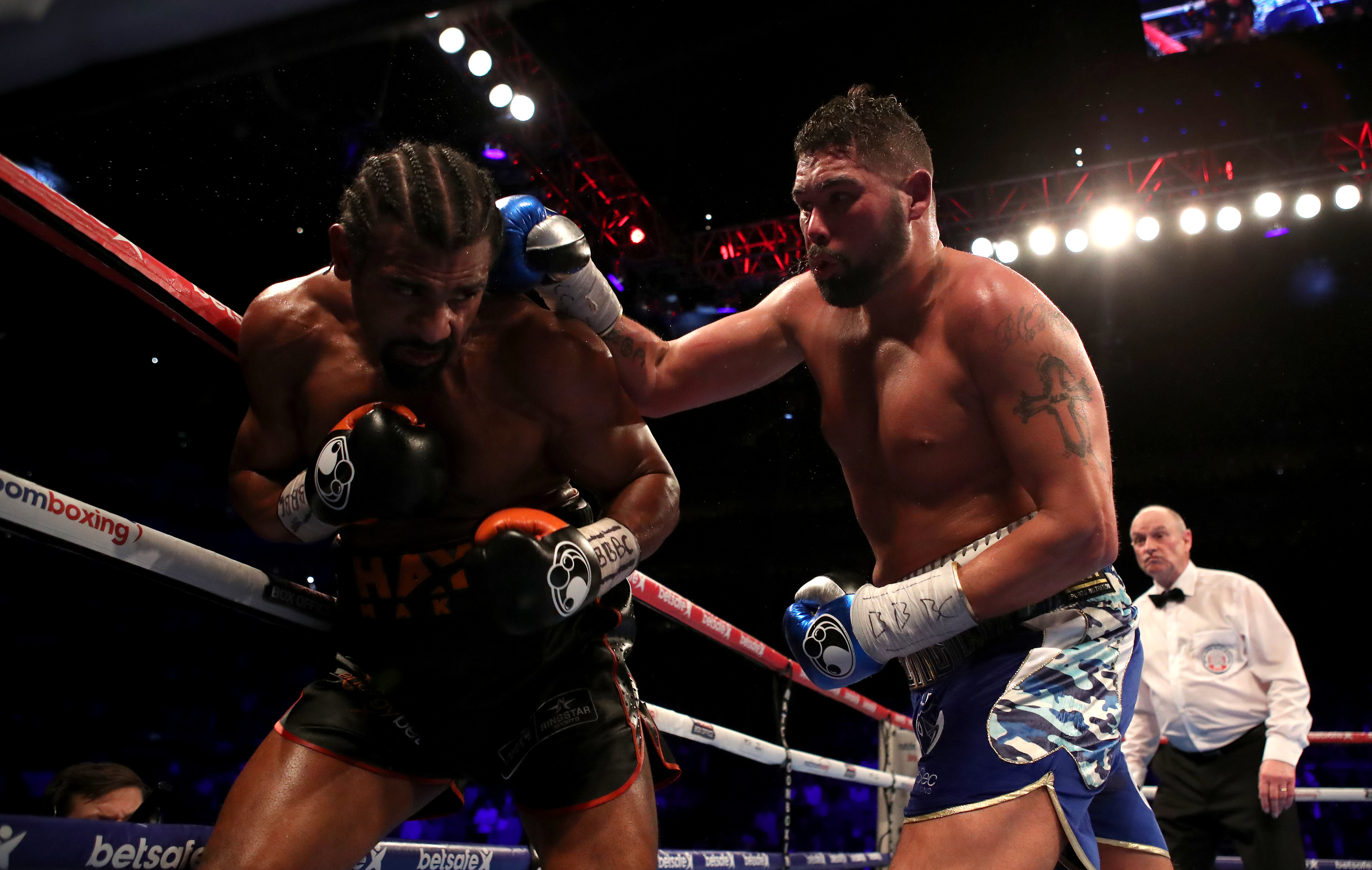 David Haye (left) takes on Tony Bellew during the heavyweight contest at The O2