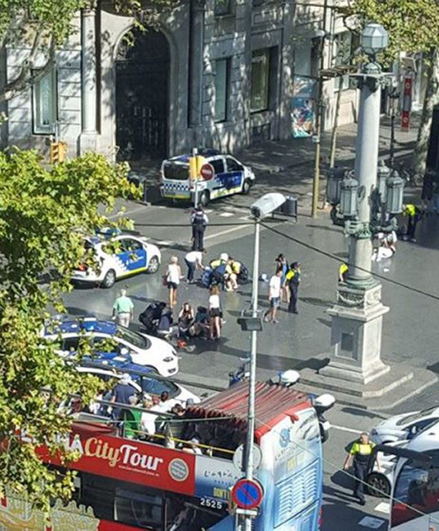 Emergency service workers at the scene in Las Ramblas