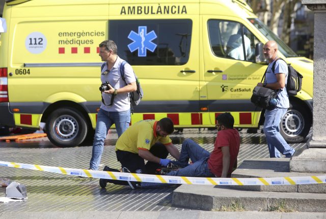 An injured person is treated in Barcelona