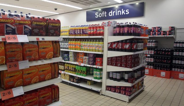 Soft drinks on supermarket shelving