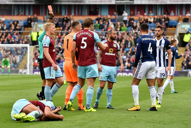 West Brom's Hal Robson-Kanu is shown a red card