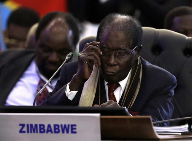 Robert Mugabe was in Pretoria for the Southern African Development Community's leaders' conference (AP)
