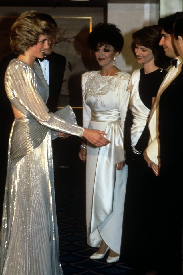 Diana, wearing a Bruce Oldfield gown, being introduced to Jean Michel Jarre and Charlotte Rampling, watched by Joan Collins