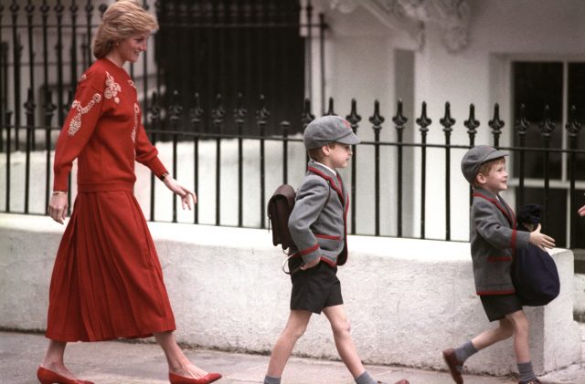 Diana, Princess of Wales following her sons Prince Harry (right), then five years old, and Prince William, then seven, on Harry's first day of school 