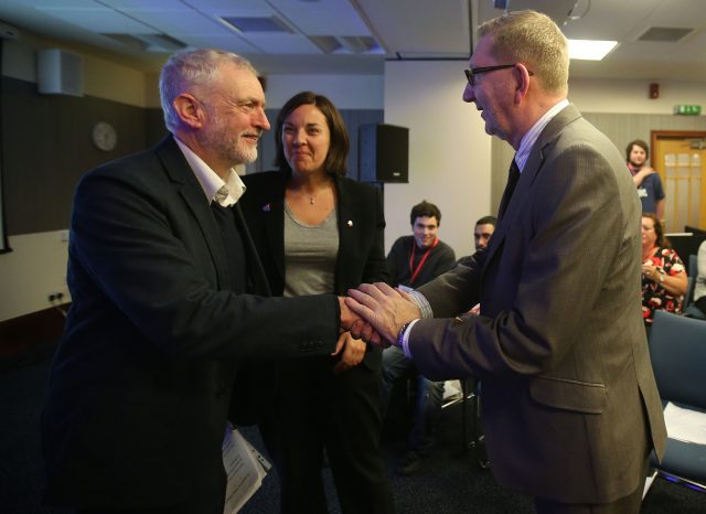 Jeremy Corbyn, left,  shakes hands with Unite general secretary Len McCluskey