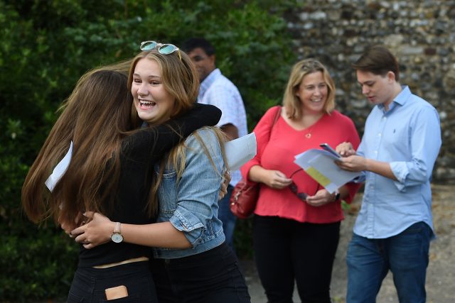 Molly Riordan (left) and Ella Gant celebrate after collecting their GCSE results at Norwich School