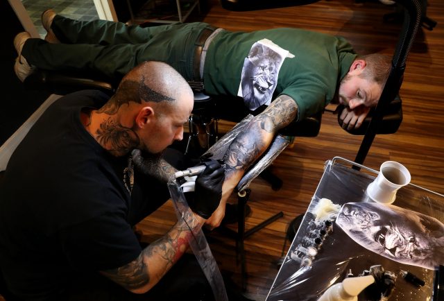 The tattoos were created by Tamas Dikac (Andrew Milligan/PA)