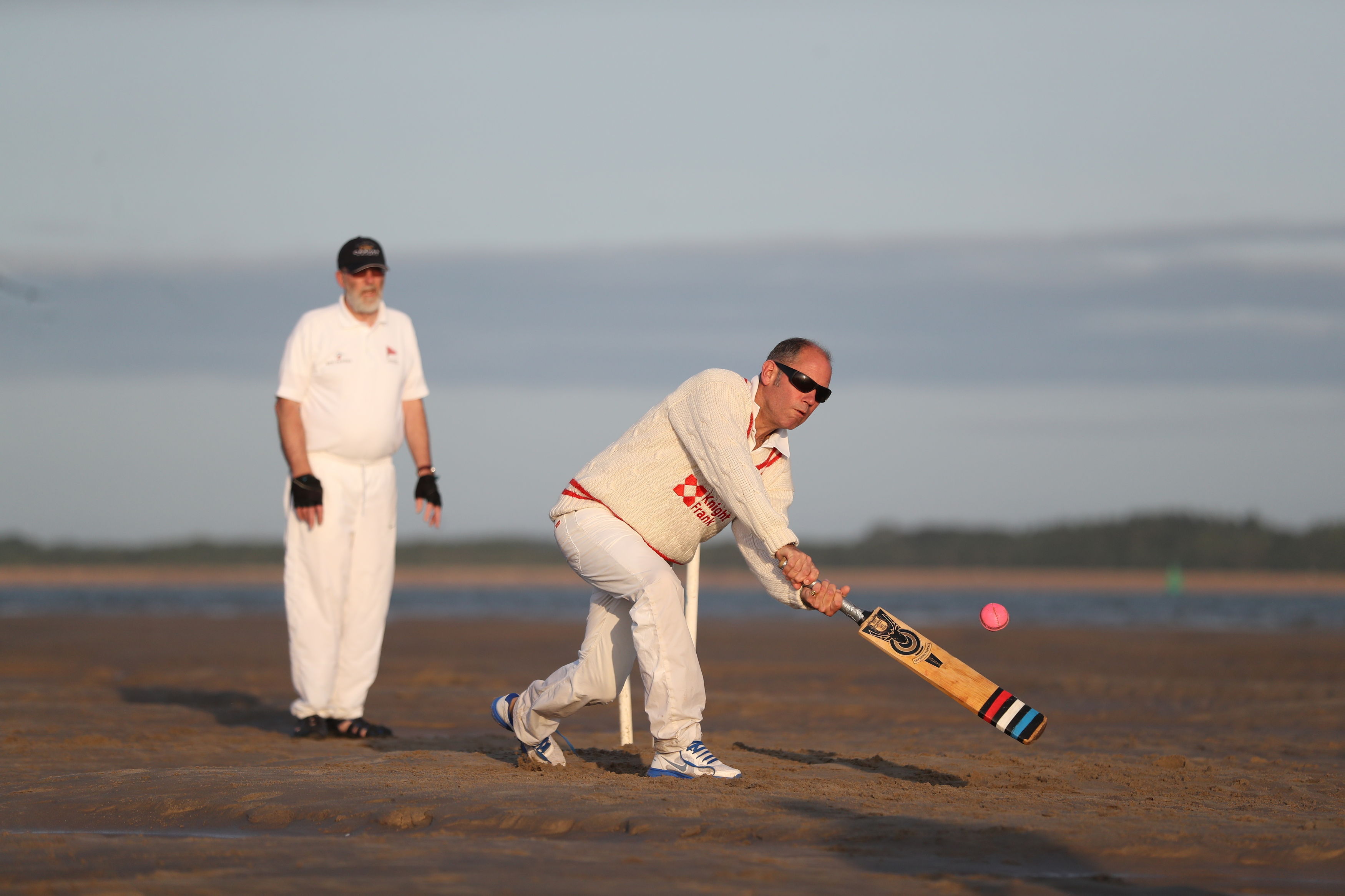 Match action during the annual Bramble Bank cricket match