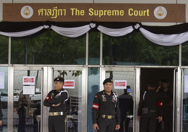 Thai soldiers stand guard outside the Supreme Court