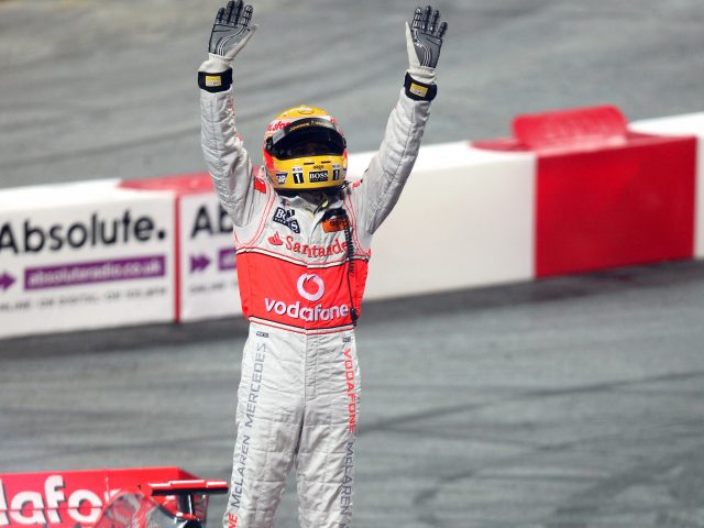 Lewis Hamilton celebrates winning the world title in 2008