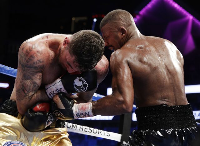 Badou Jack, of Sweden, hits Nathan Cleverly, of Wales